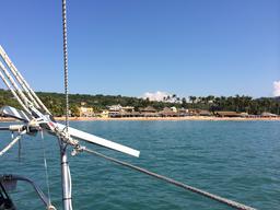 The row of restaurants on the beach in Chacala as seen from Crazy Love at anchor.