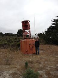 Dave standing next to a navigation bouy near Point Pinos Lighthouse