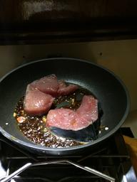 Steaks on the pan.