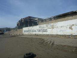 Welcome sign on the beach at Bahia Tortugas.  There were many used tires in the sand.